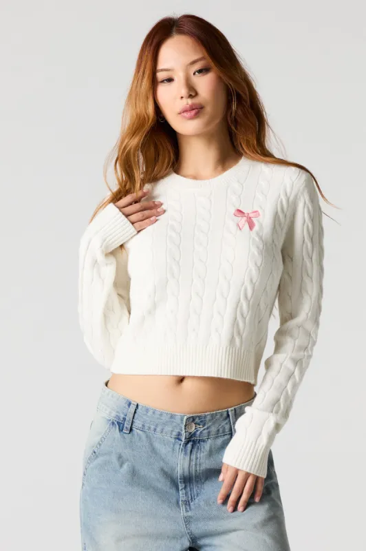 Embroidered Cable Knit Cropped Sweater sold by Charlotte Russe