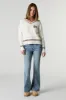 Vintage Medium Wash Flare Stretchy Jean sold by Charlotte Russe