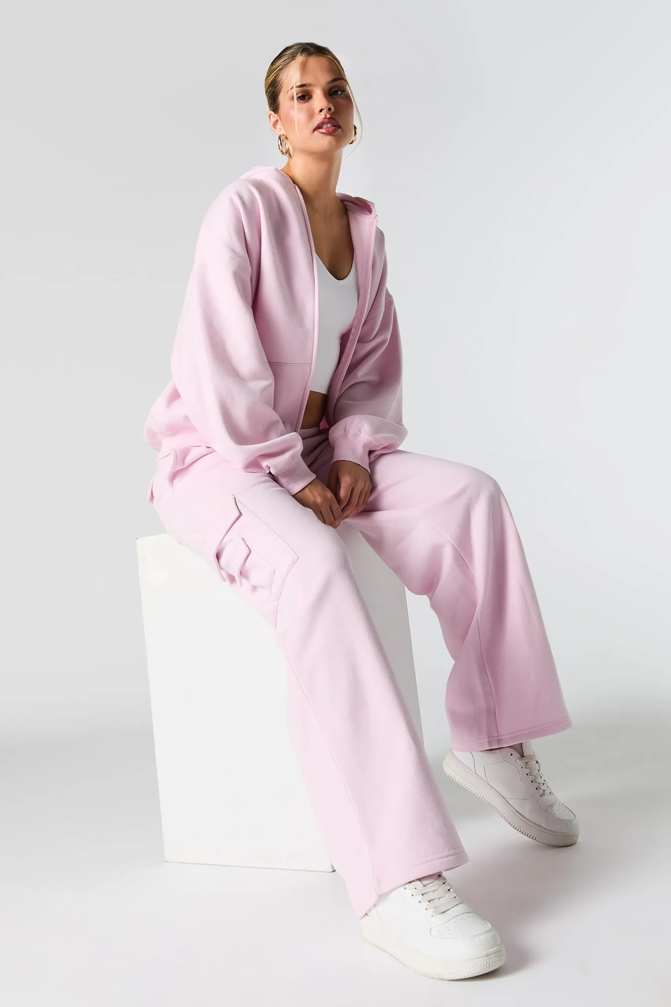 Solid Fleece Wide Leg Cargo Sweatpant sold by Charlotte Russe