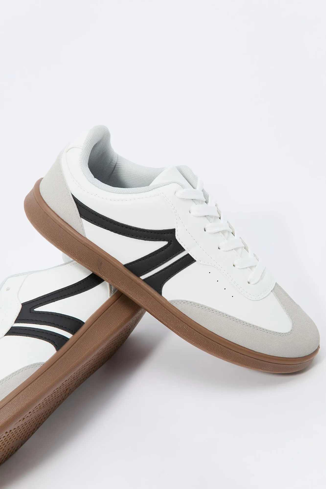 Faux Leather Low Top Retro Sneaker sold by Charlotte Russe