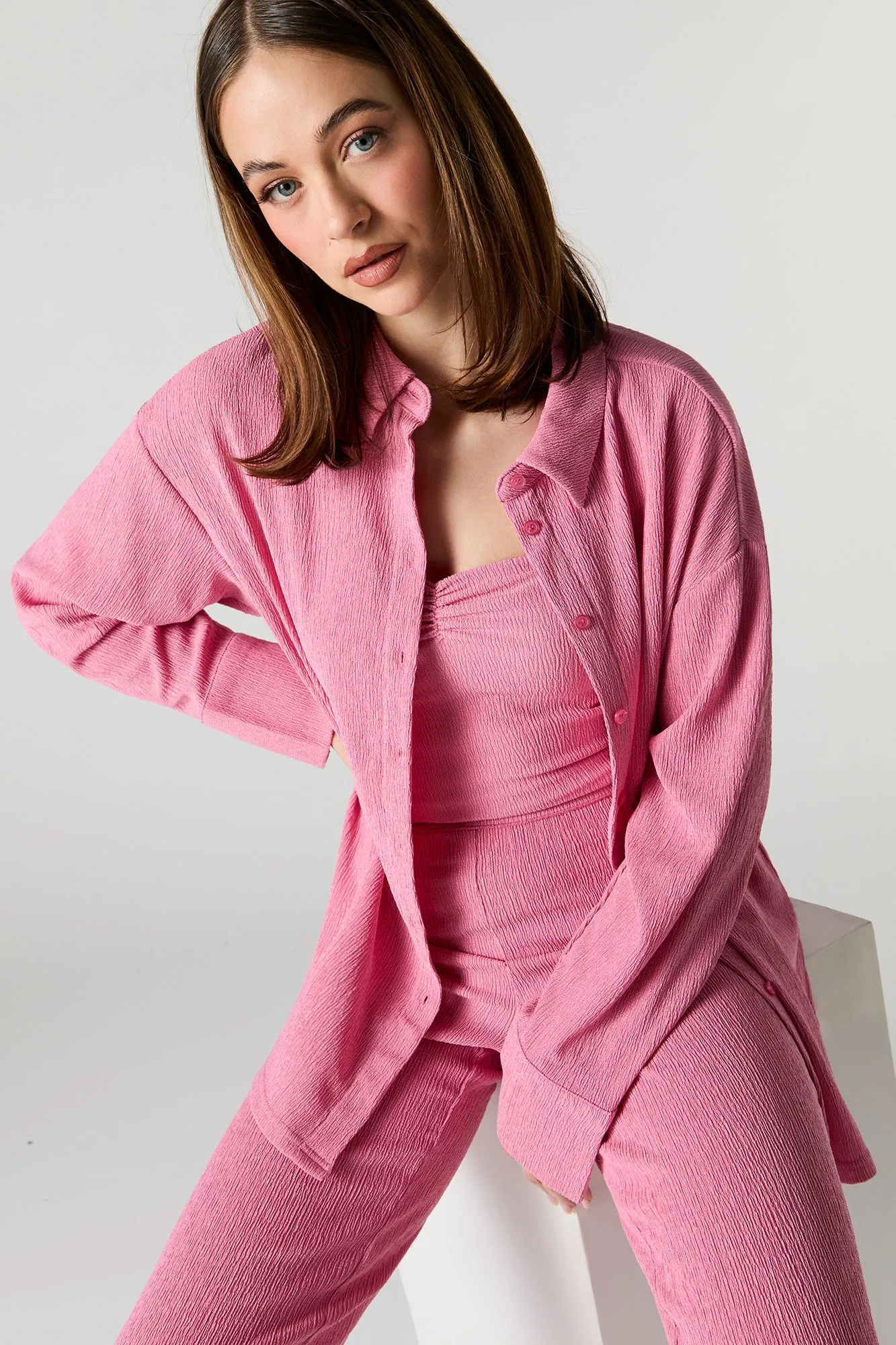 Crinkle Oversized Button-Up Top sold by Charlotte Russe