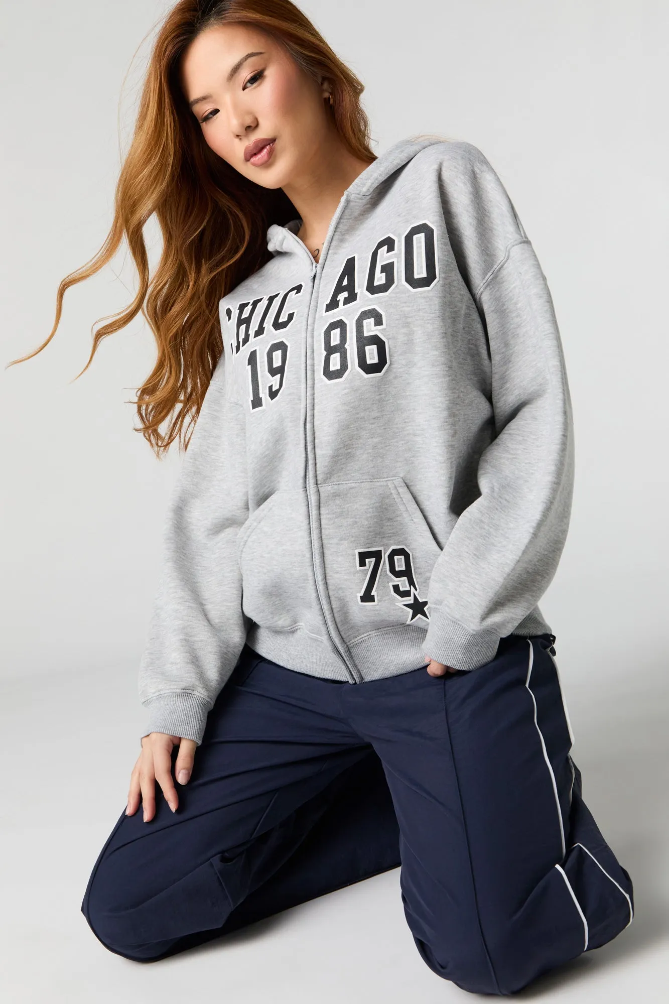 Oversized Printed Zip-Up Fleece Hoodie sold by Charlotte Russe
