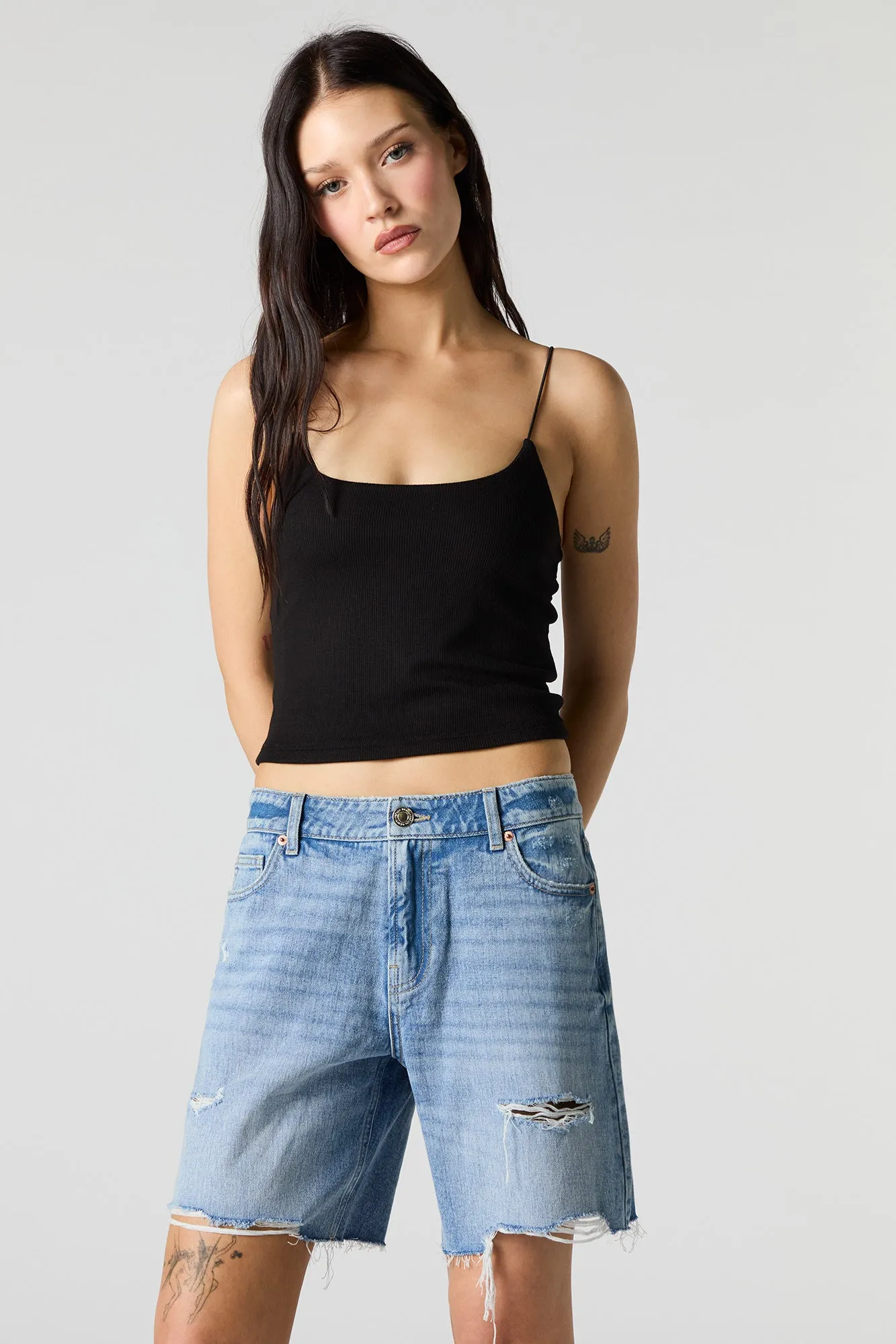 Medium Wash Distressed Jort sold by Charlotte Russe