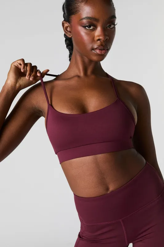 Solid Sports Bra with Built-In Bra Cups sold by Charlotte Russe