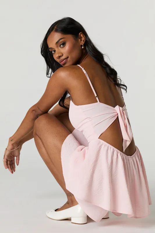 Flowy Tie Back Tiered Romper sold by Charlotte Russe