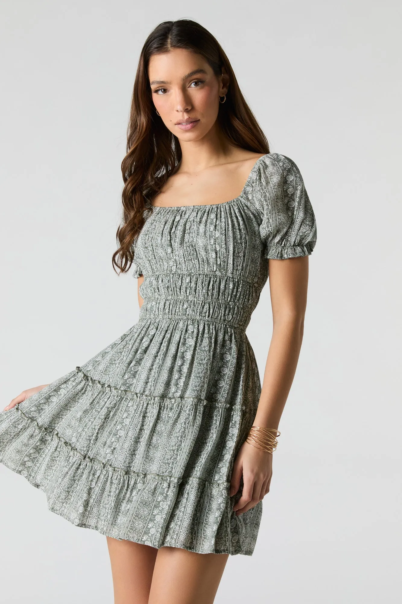 Smocked Tiered Mini Dress sold by Charlotte Russe