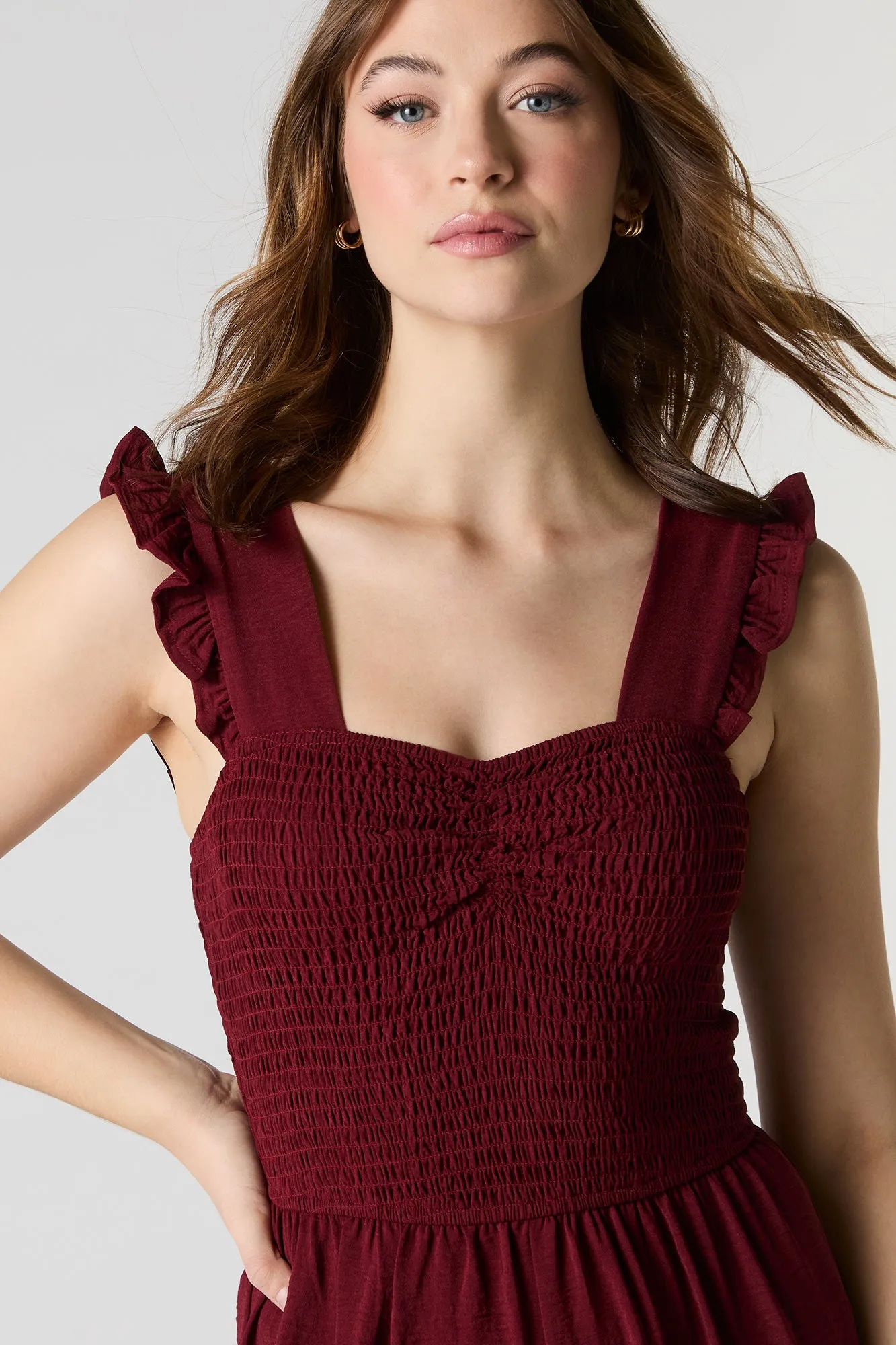 Smocked Flutter Strap Wide Leg Jumpsuit sold by Charlotte Russe