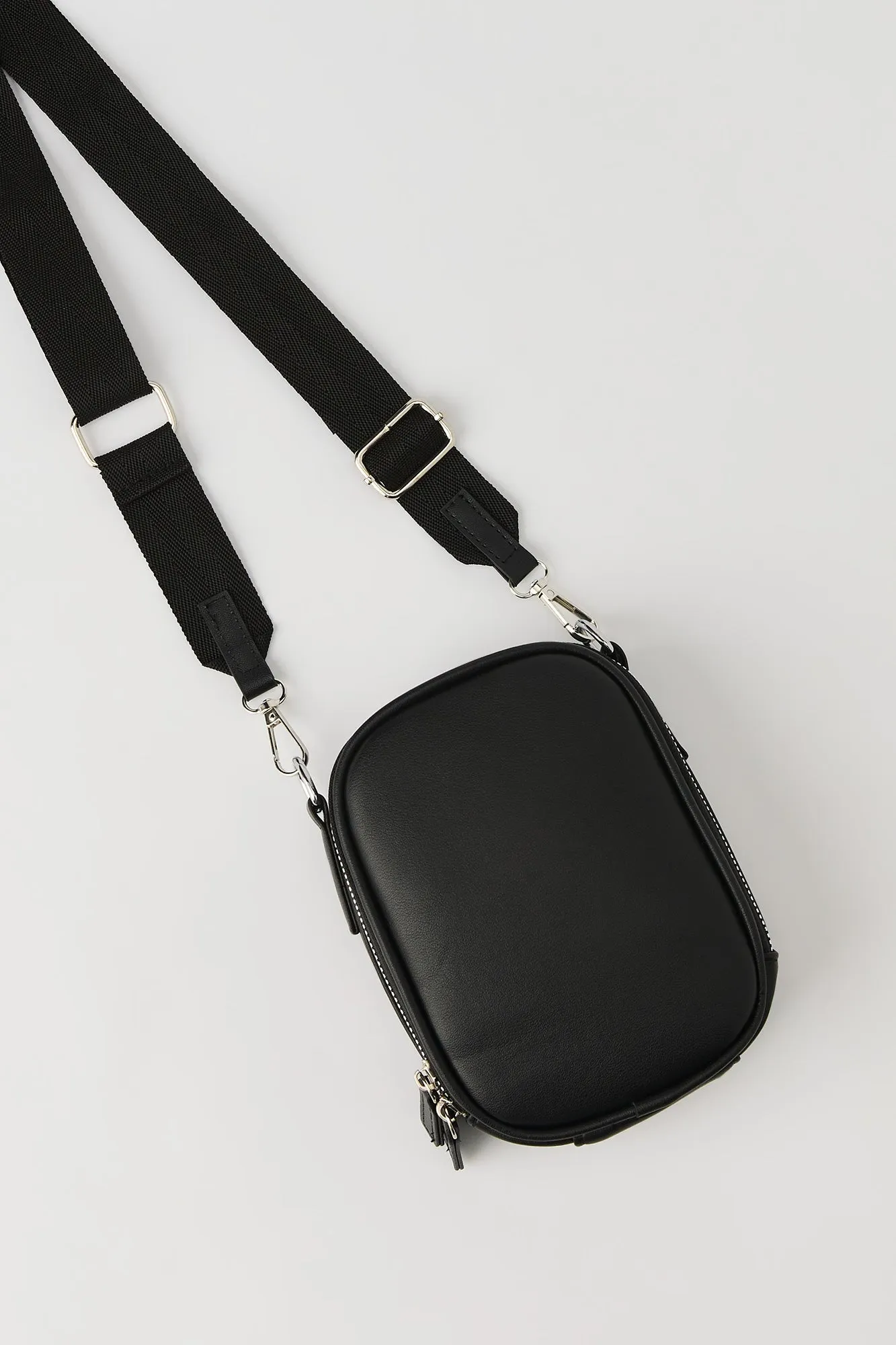 Faux Leather Mini Crossbody Bag sold by Charlotte Russe