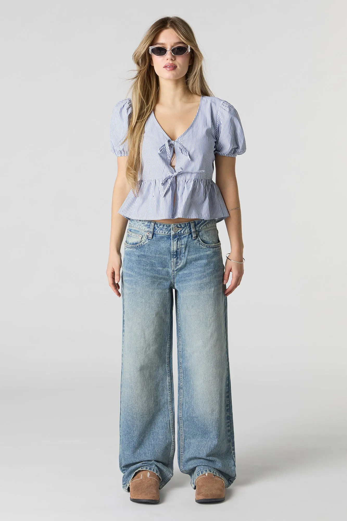 Vintage Medium Wash Low Rise Skater Jean sold by Charlotte Russe