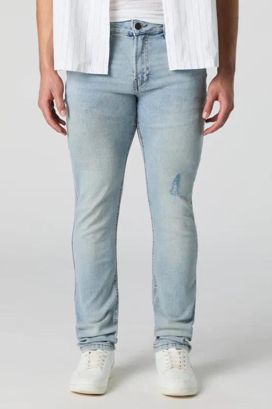 Light Wash Lightly Distressed Skinny Jean sold by Charlotte Russe