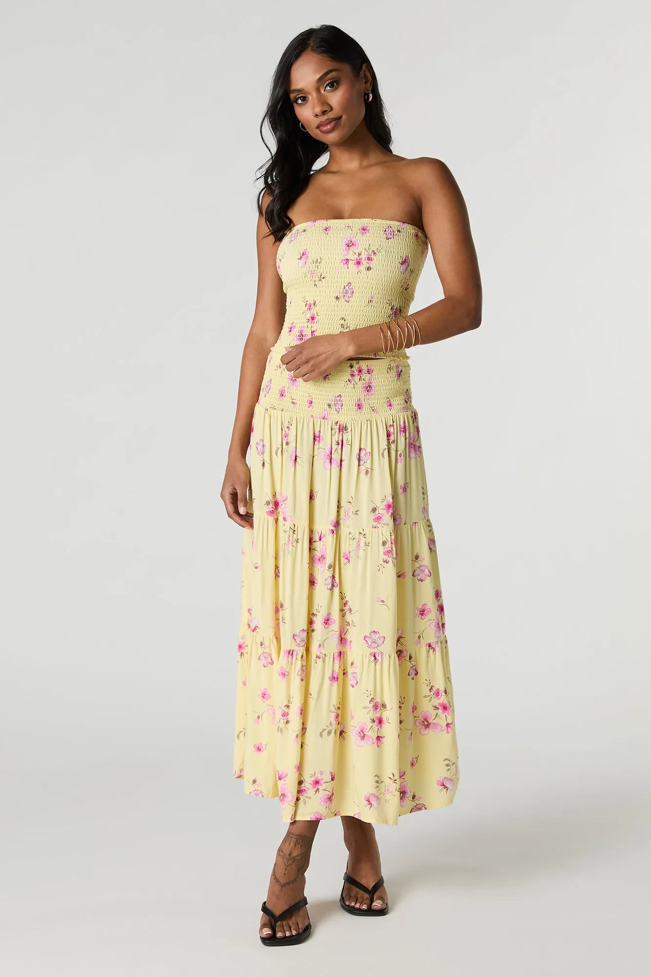 Floral Smocked Maxi Skirt sold by Charlotte Russe