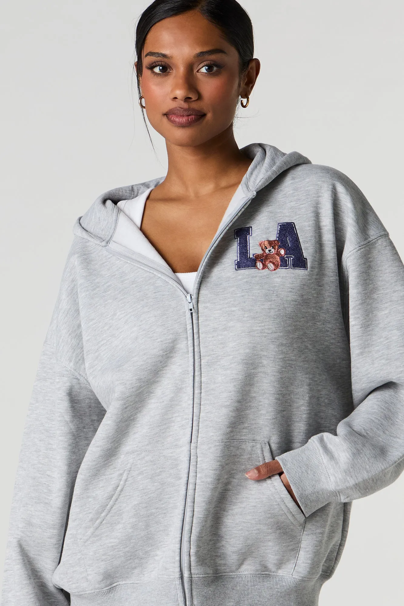 Oversized Embroidered Fleece Zip-Up Hoodie sold by Charlotte Russe