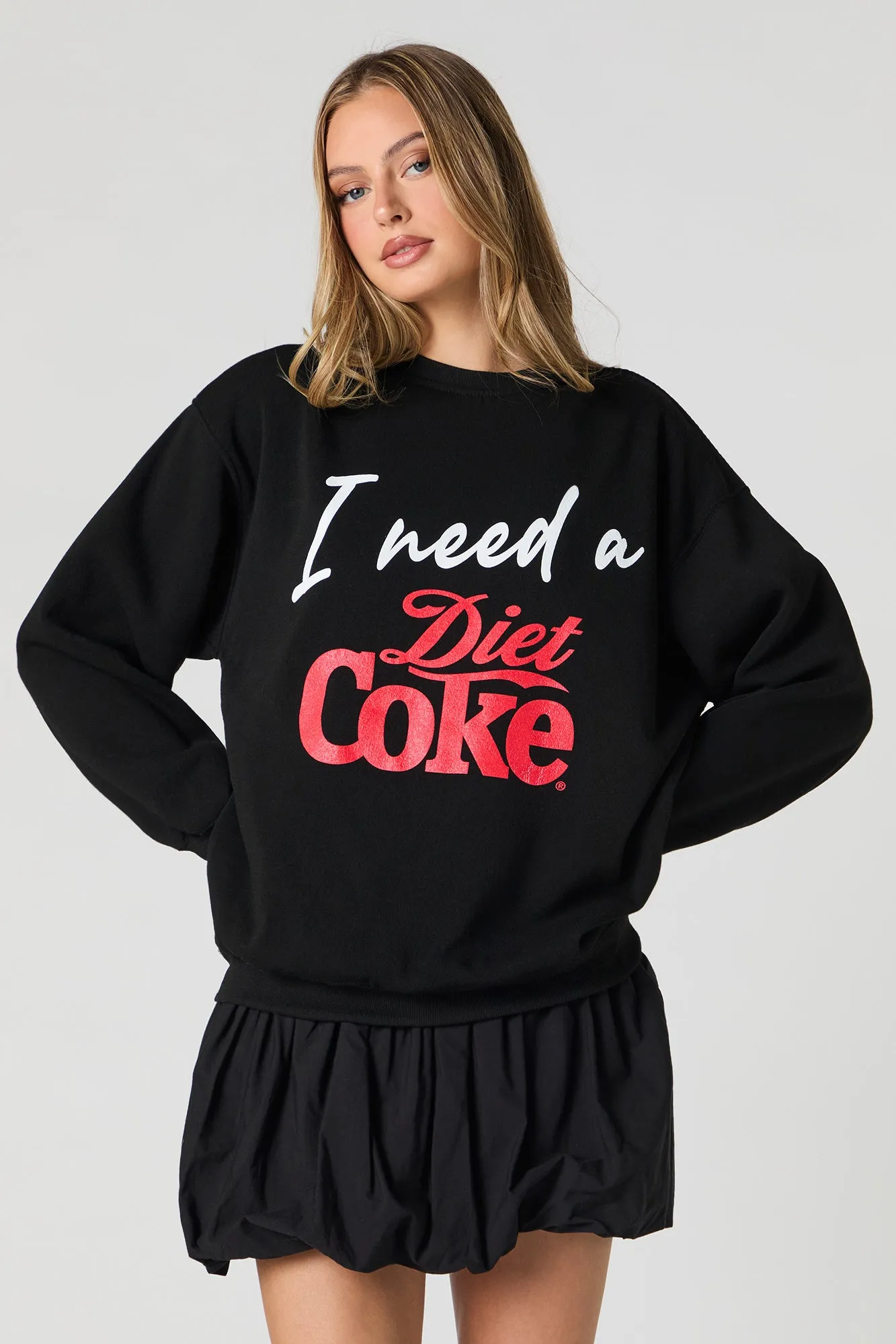 I Need Diet Coke Graphic Fleece Sweatshirt sold by Charlotte Russe