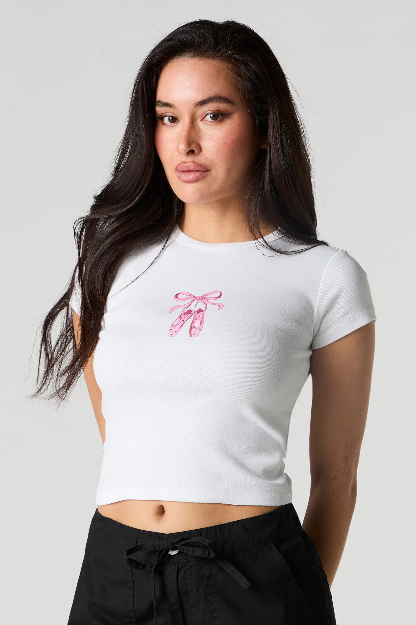 Girly Graphic Ribbed Cropped T-Shirt sold by Charlotte Russe