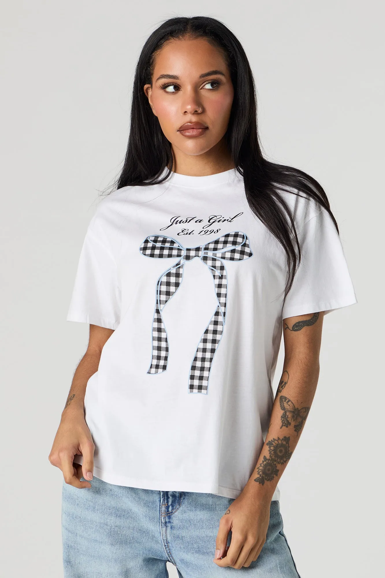 Just a Girl Graphic Boyfriend T-Shirt sold by Charlotte Russe