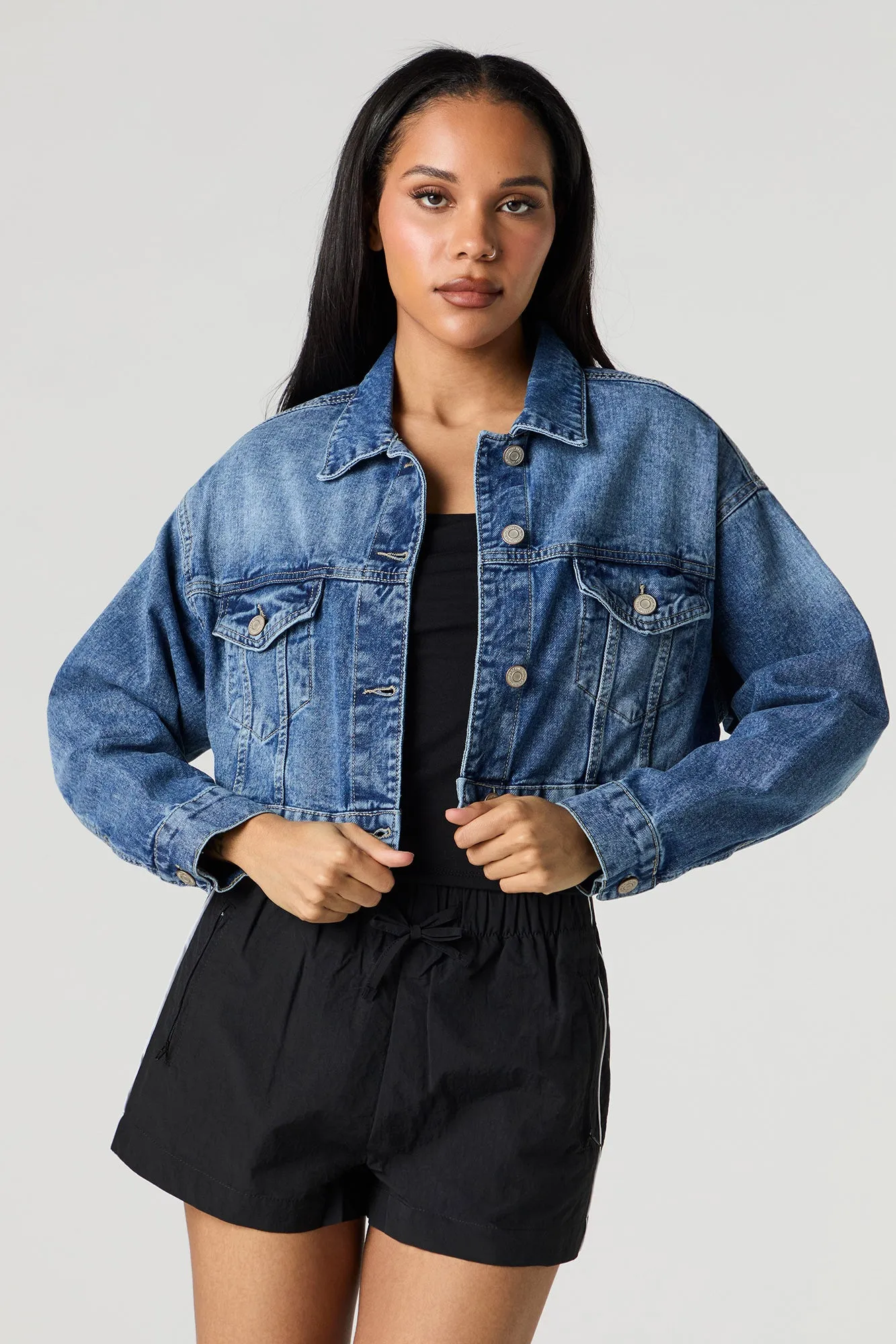 Cropped Denim Trucker Jacket sold by Charlotte Russe