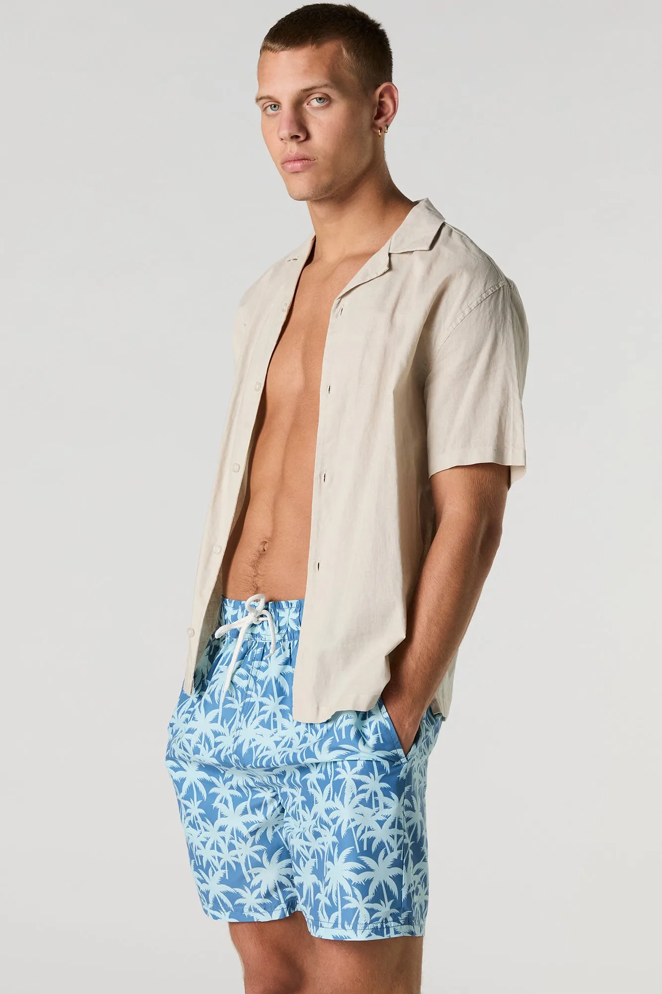 Tropical Print Drawstring Swim Short sold by Charlotte Russe