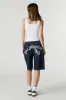 Graphic Jort sold by Charlotte Russe