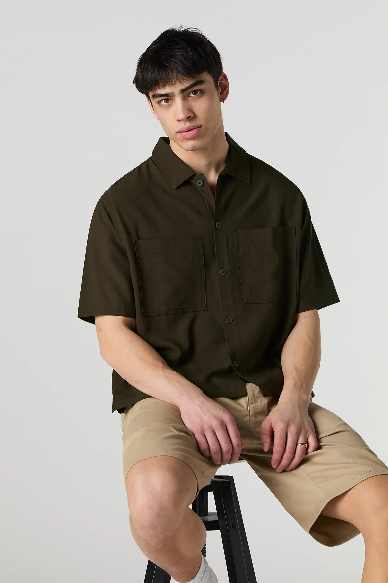 Boxy Button-Up Short Sleeve Top sold by Charlotte Russe