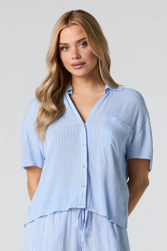 Crinkle Oversized Button-Up Top sold by Charlotte Russe