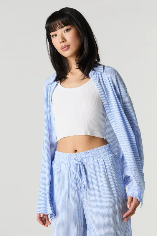 Oversized Button-Up Side Slit Top sold by Charlotte Russe