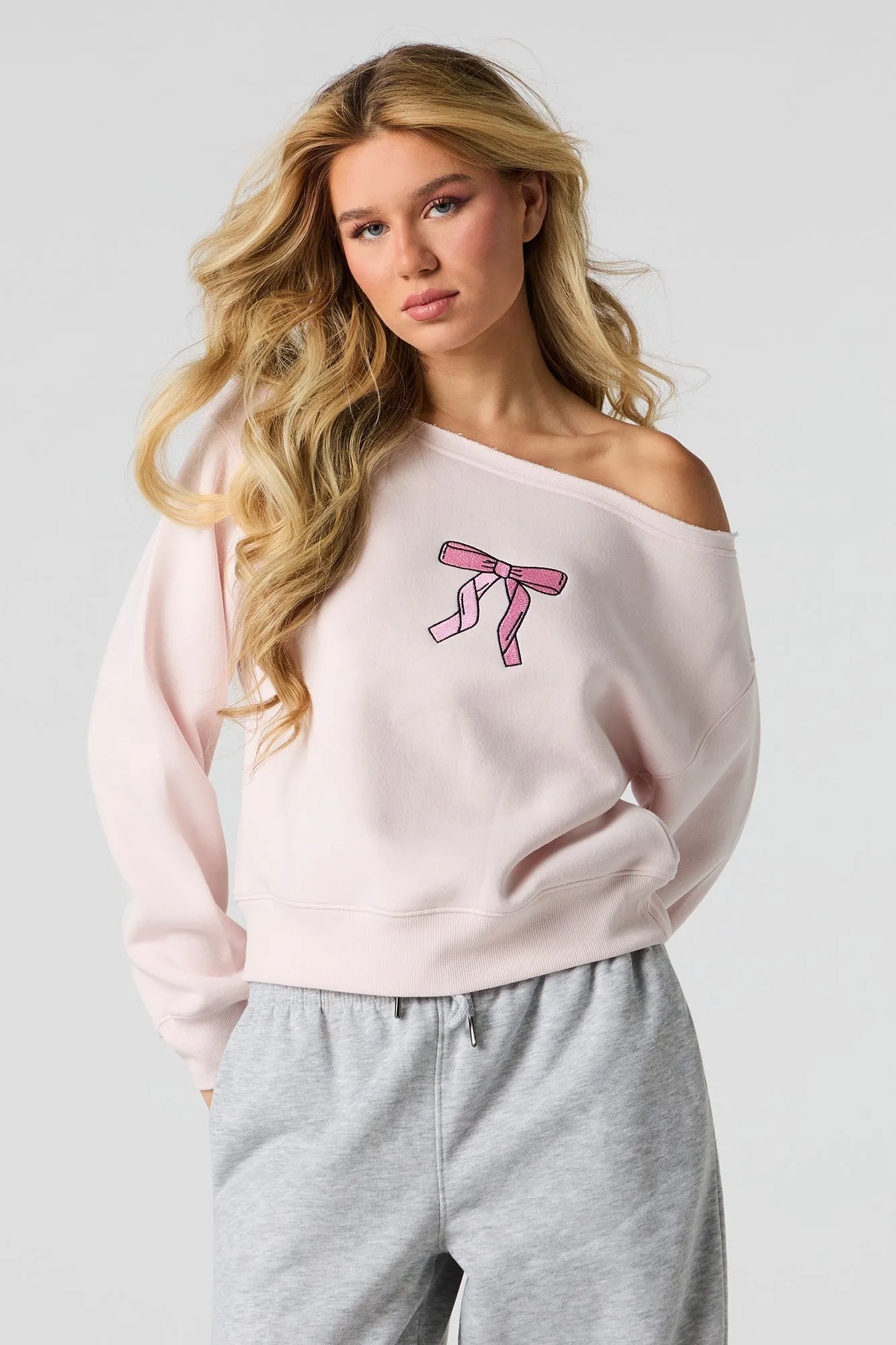 Embroidered Off Shoulder Fleece Sweatshirt sold by Charlotte Russe