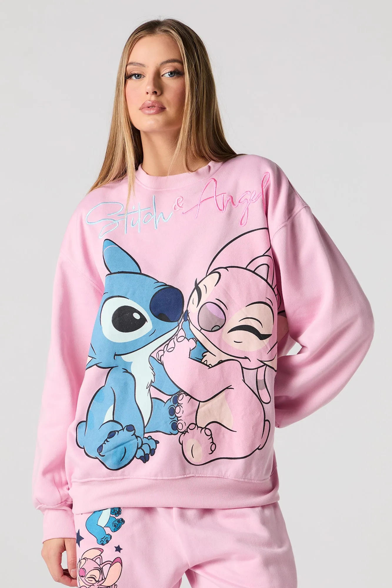 Stitch & Angel Embroidered Fleece Sweatshirt sold by Charlotte Russe