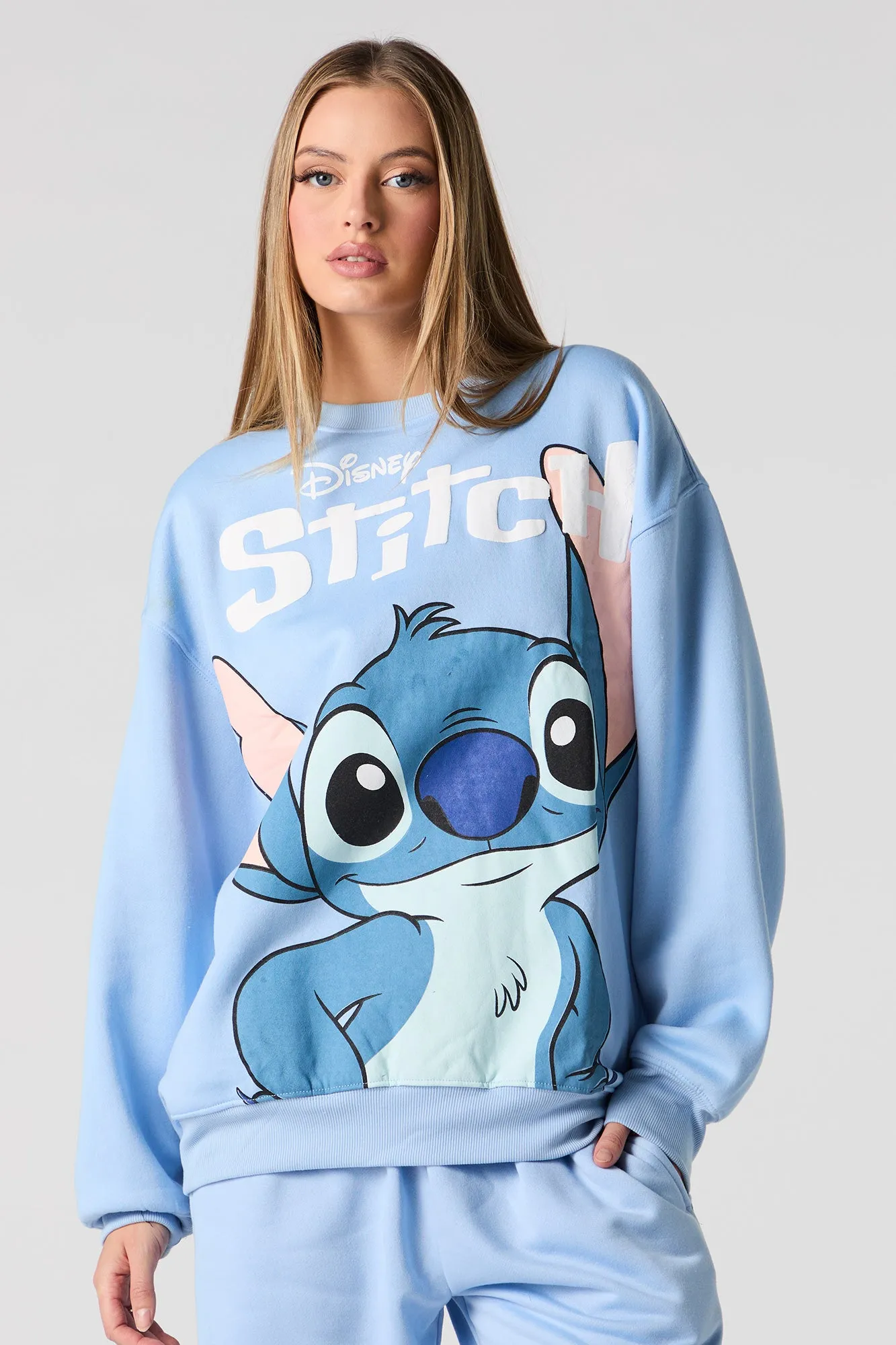 Stitch Graphic Fleece Sweatshirt sold by Charlotte Russe