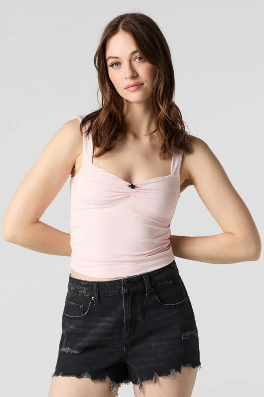 Contour Cinched Rosette Tank sold by Charlotte Russe
