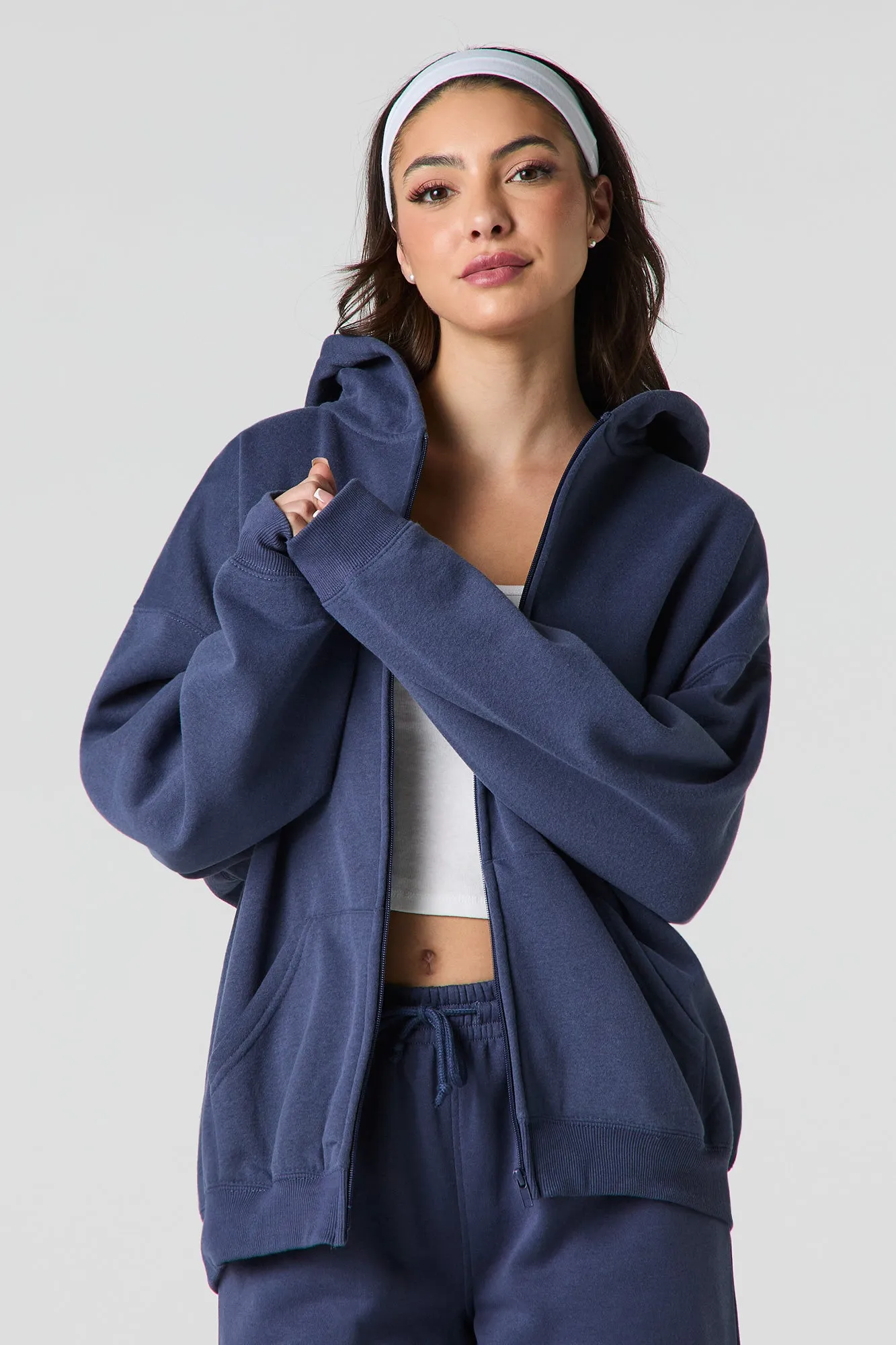 Oversized Fleece Zip-Up Hoodie sold by Charlotte Russe