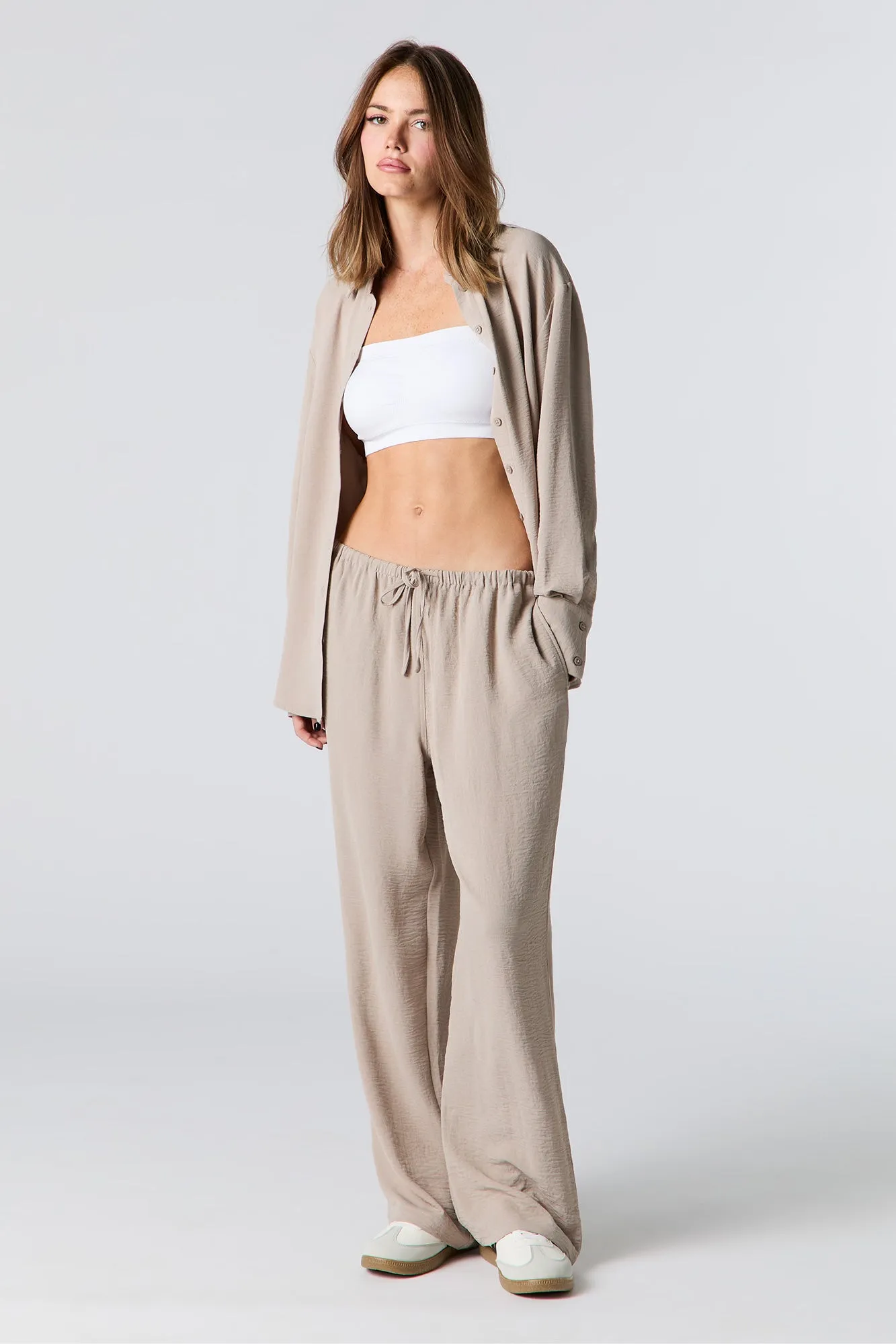 Flowy Drawstring Pant sold by Charlotte Russe