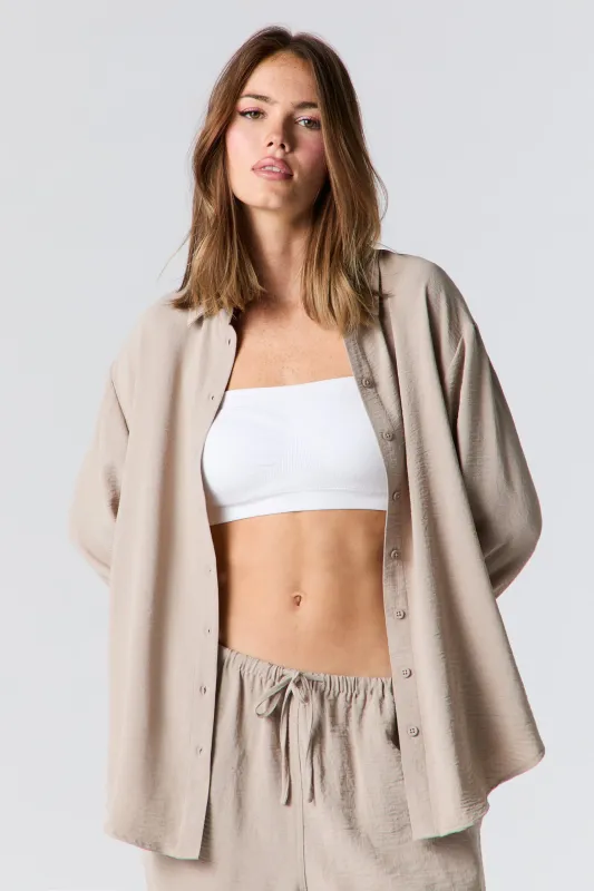 Flowy Long Sleeve Button-Up Top sold by Charlotte Russe