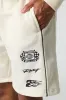 Racing Graphic Fleece Short sold by Charlotte Russe