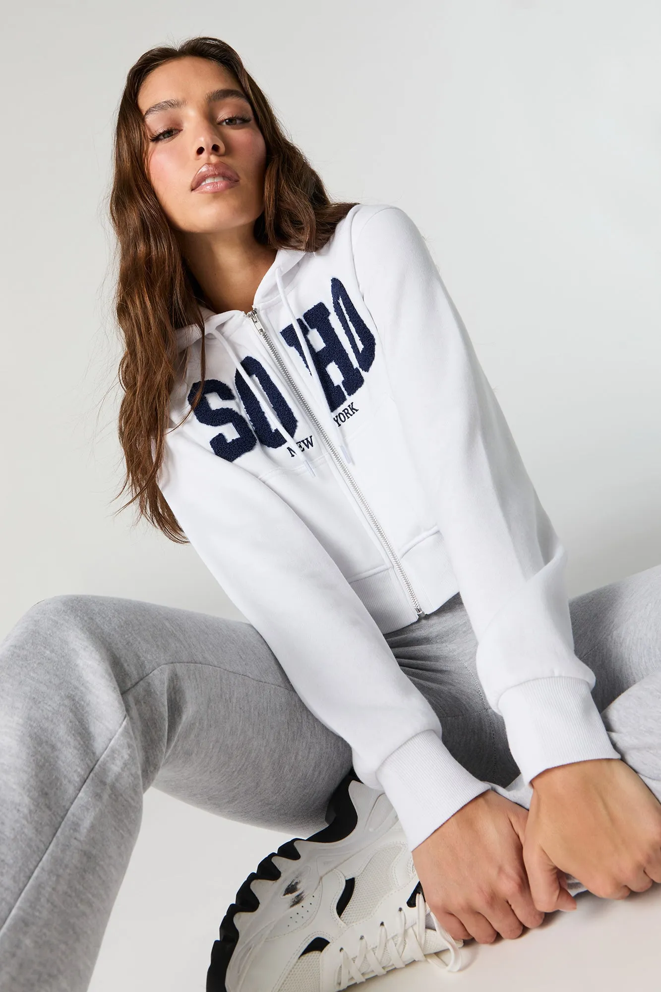 Destination Embroidered Zip-Up Cropped Hoodie sold by Charlotte Russe