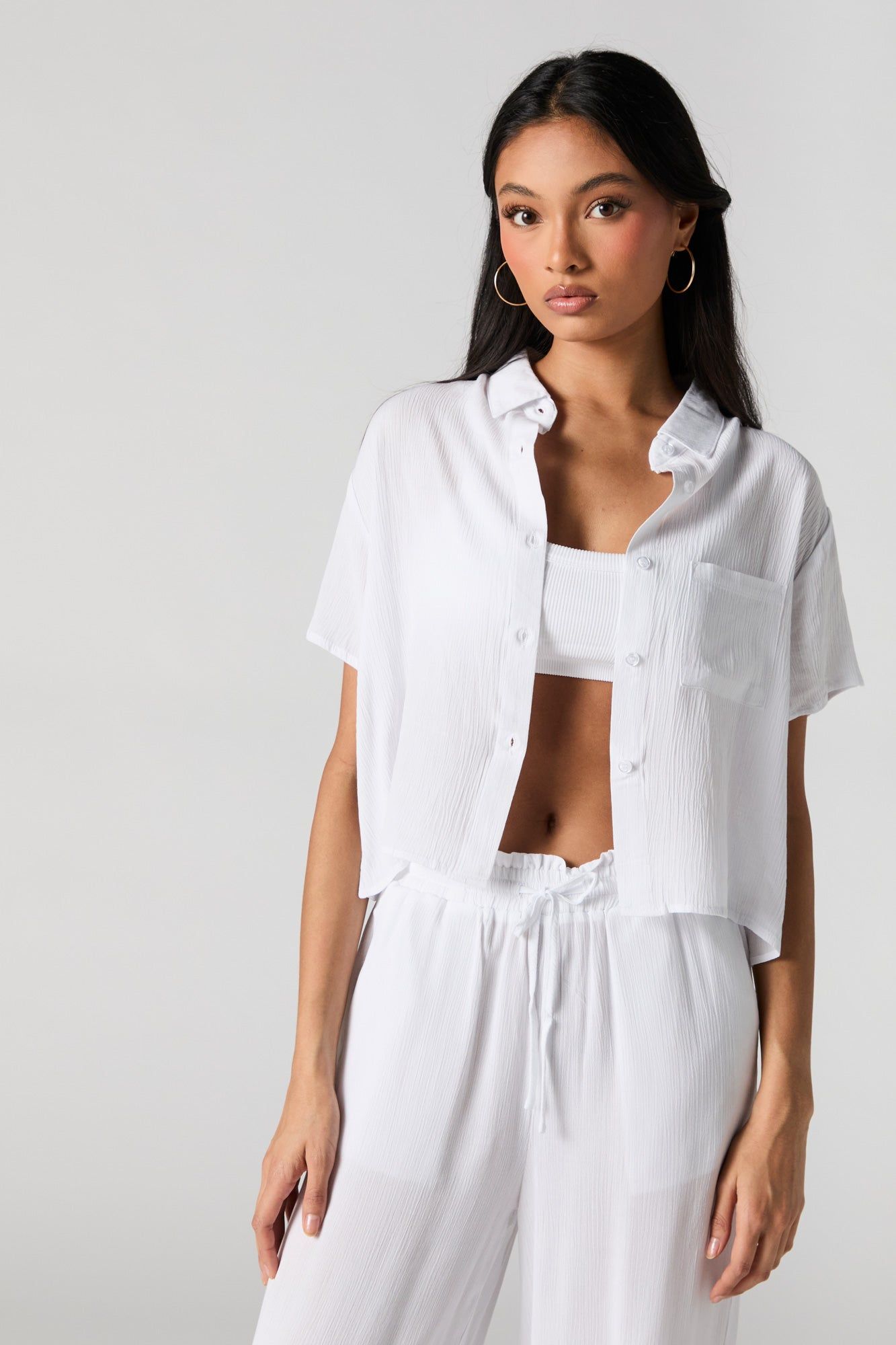 Textured Cropped Button-Up Top sold by Charlotte Russe