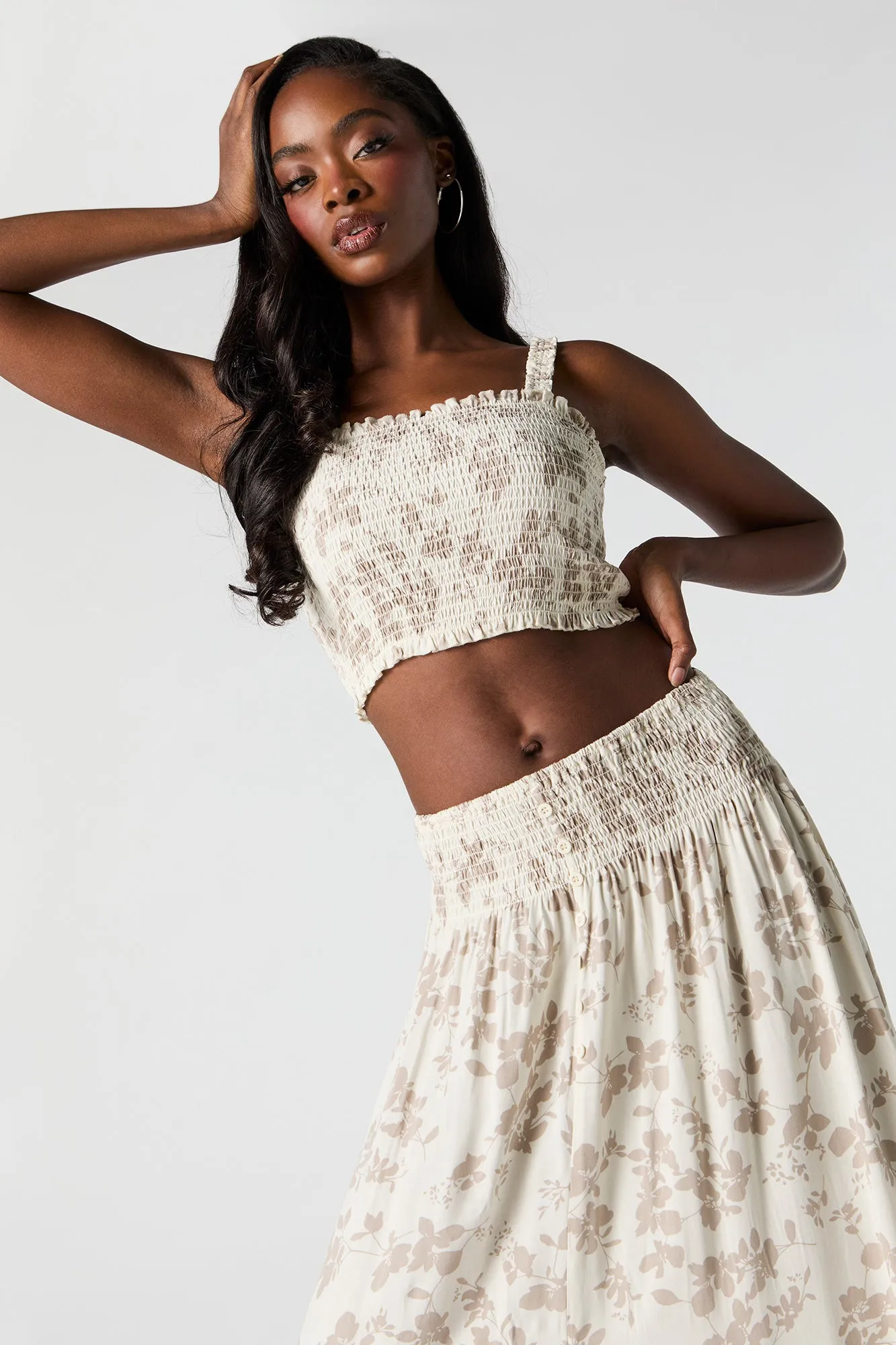 White Floral Smocked Cropped Tank sold by Charlotte Russe