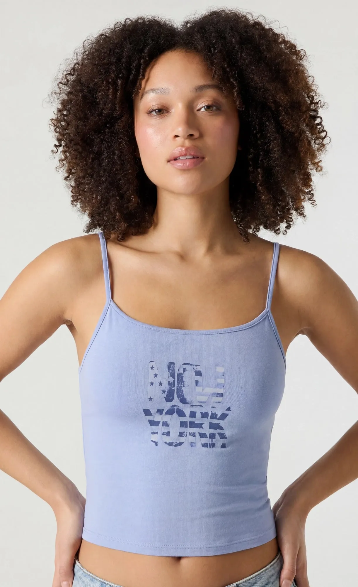 Graphic Tank sold by Charlotte Russe