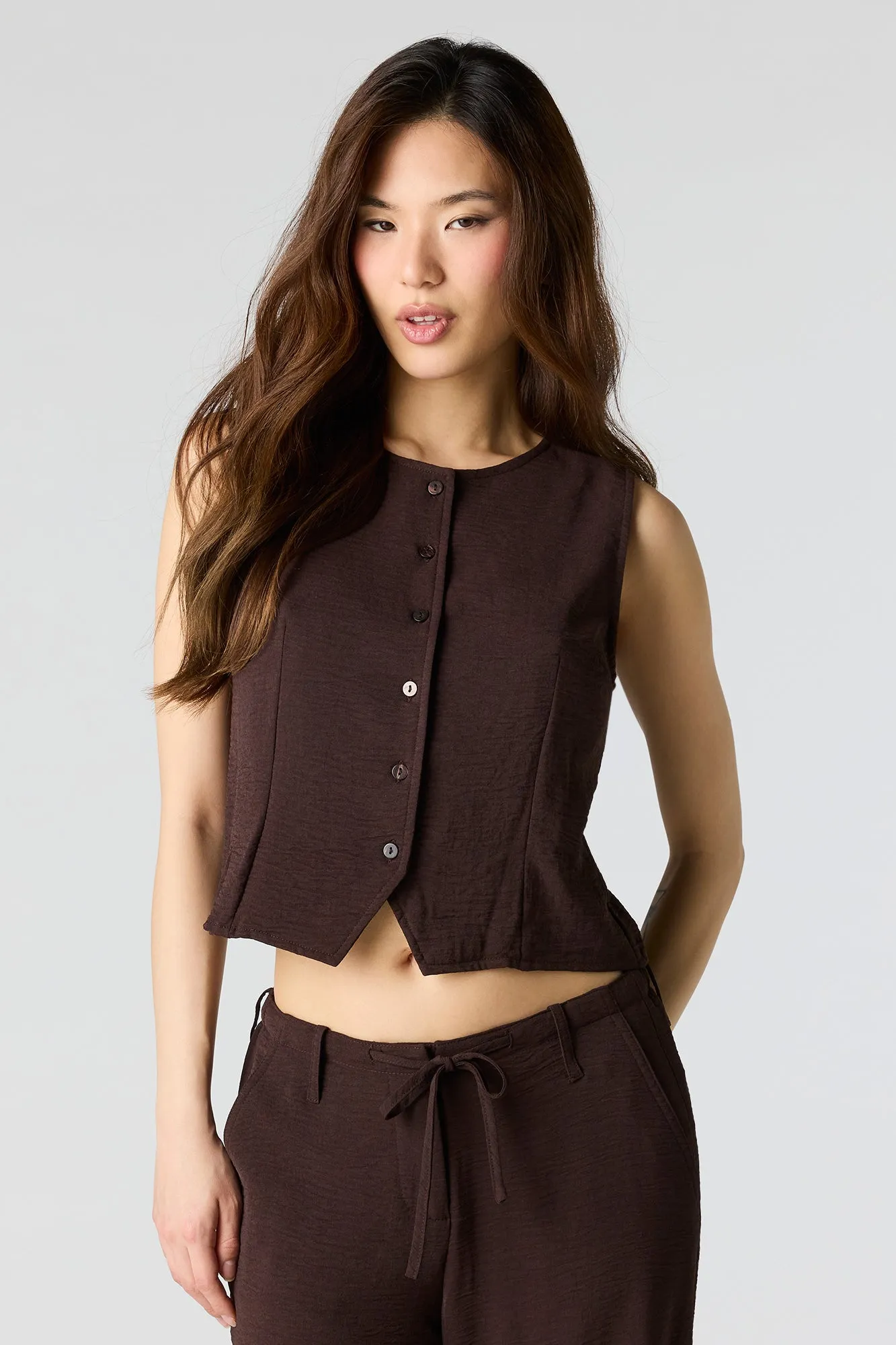 Flowy Button-Up Vest sold by Charlotte Russe