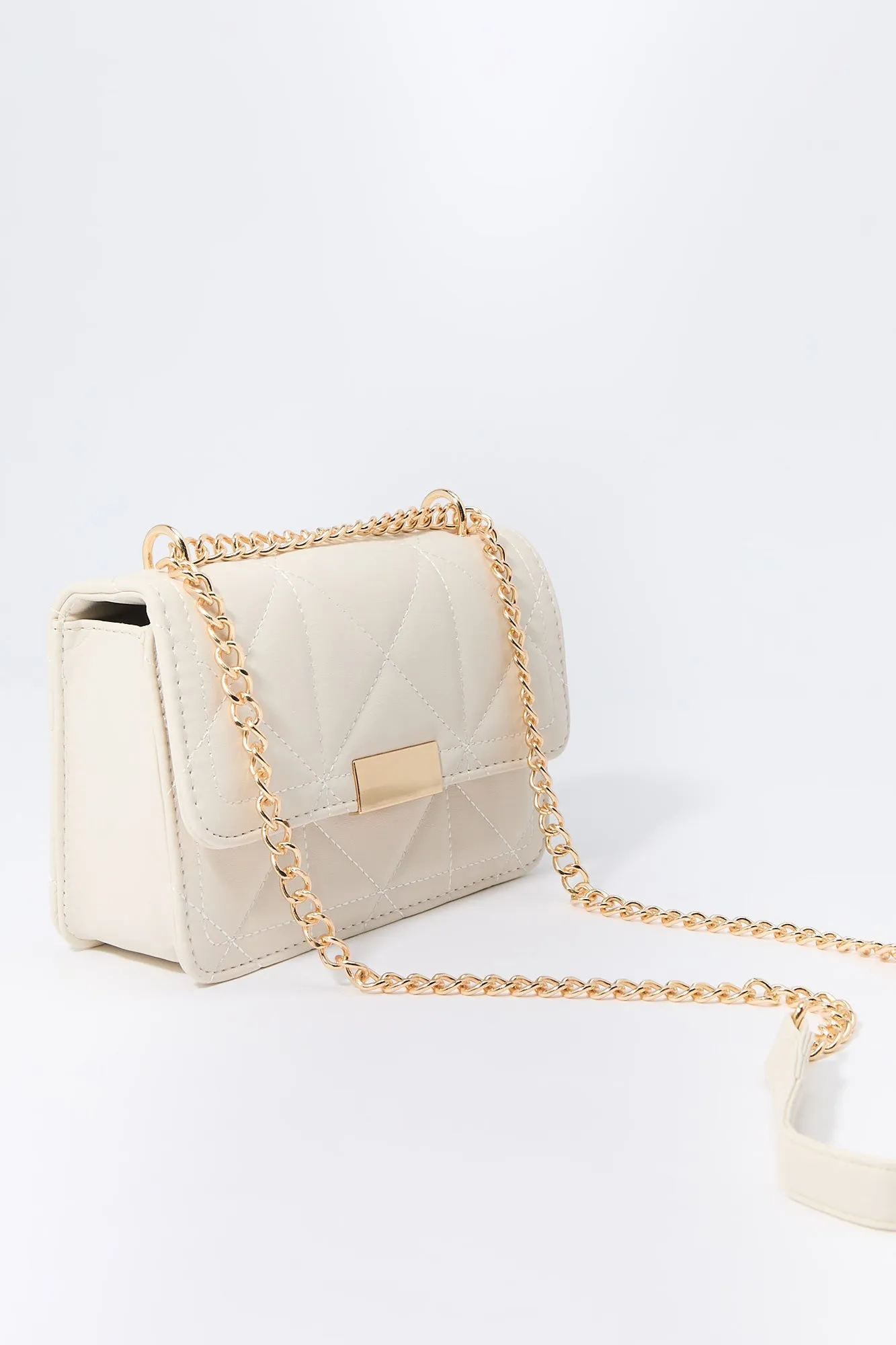 Faux Leather Quilted Crossbody Bag sold by Charlotte Russe