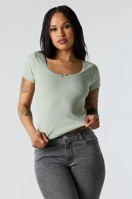 Ribbed Lace Bow Trim T-Shirt sold by Charlotte Russe