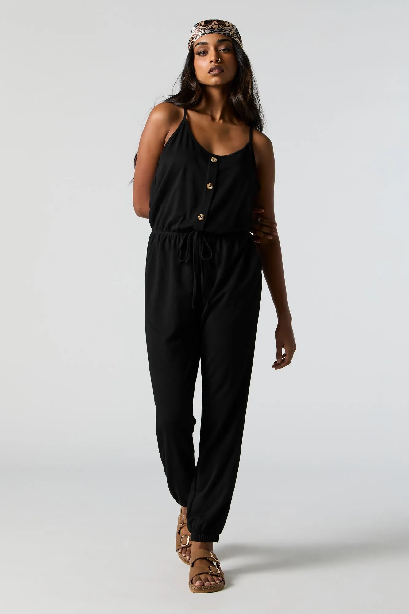 Button-Up Cami Jumpsuit sold by Charlotte Russe