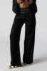 Linen Embroidered Smocked Palazzo Pant sold by Charlotte Russe