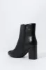 Faux-Leather Pointed Toe Heeled Bootie sold by Charlotte Russe
