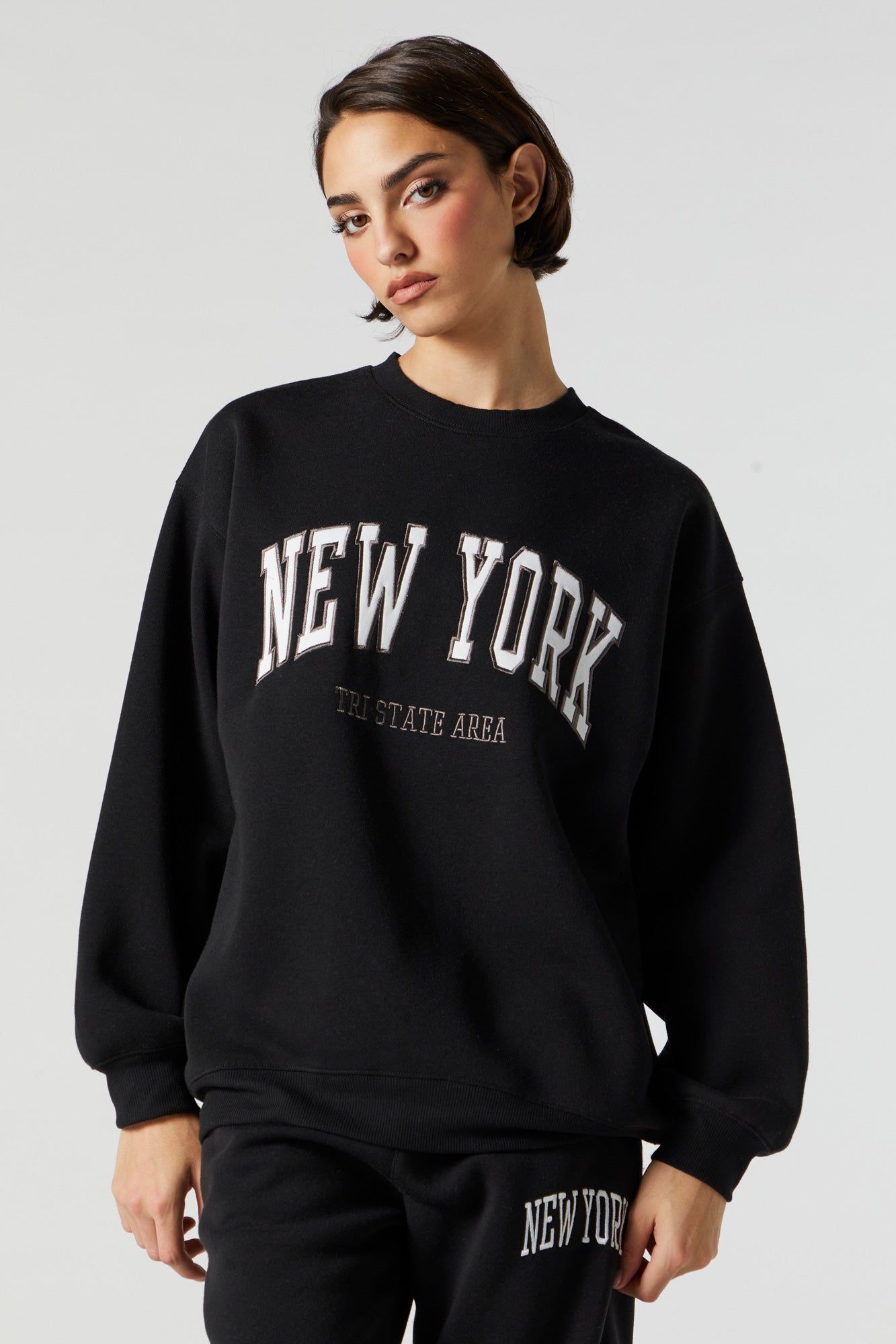 Chenille Embroidered New York Fleece Sweatshirt sold by Charlotte Russe