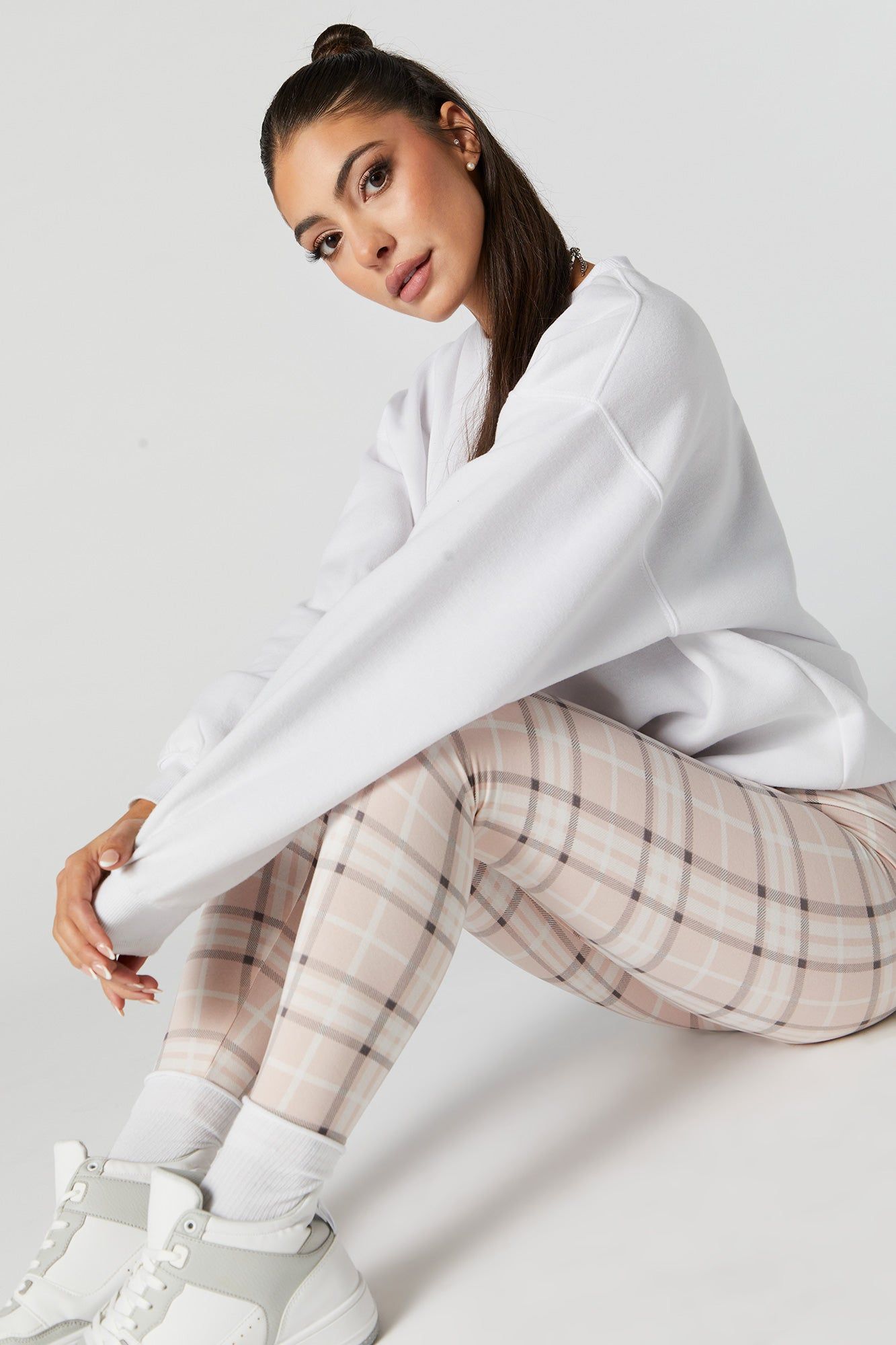 Pink Plaid Print Fleece Legging sold by Charlotte Russe