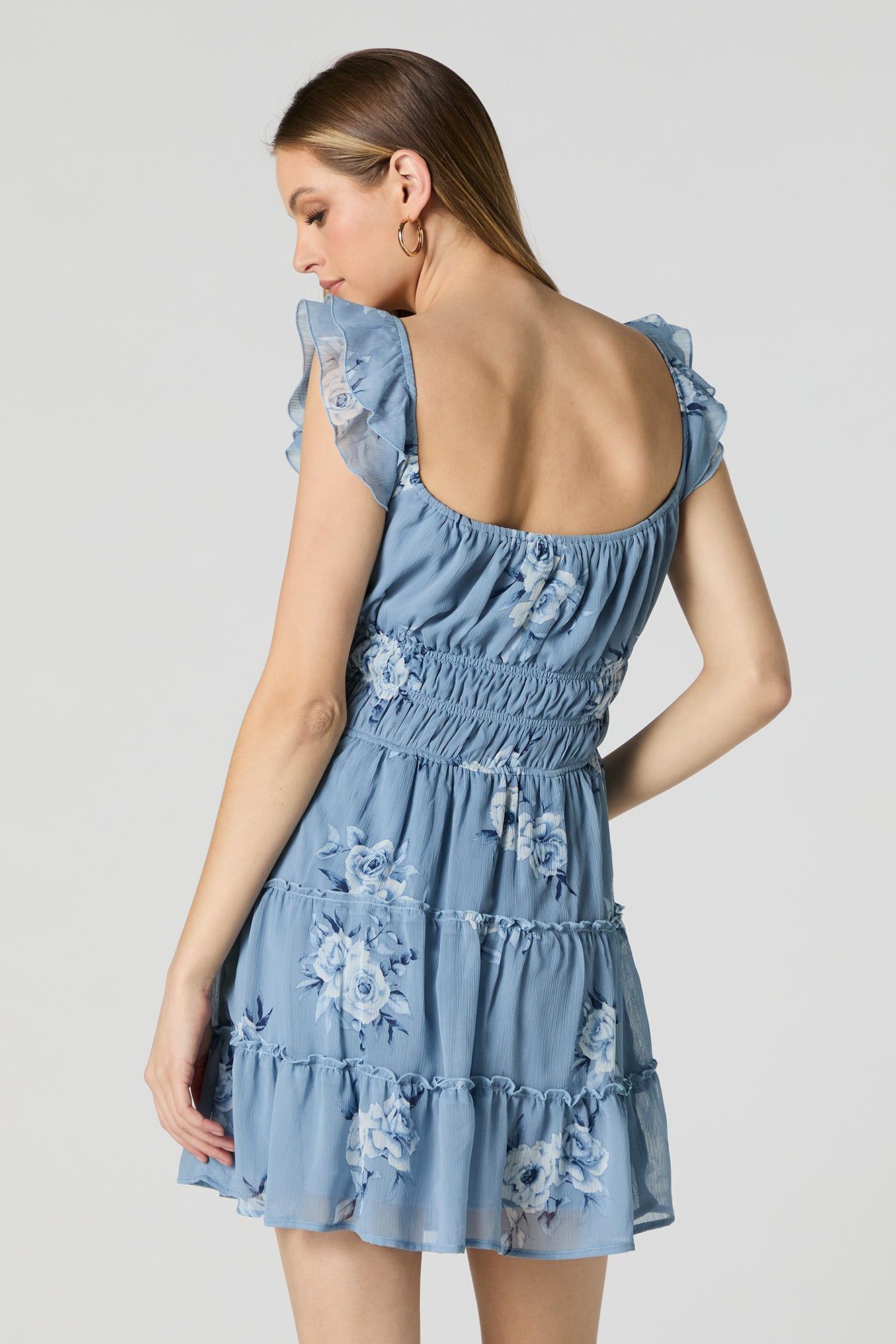 Blue Floral Smocked Flutter Sleeve Mini Dress sold by Charlotte Russe product image thumbnail 2