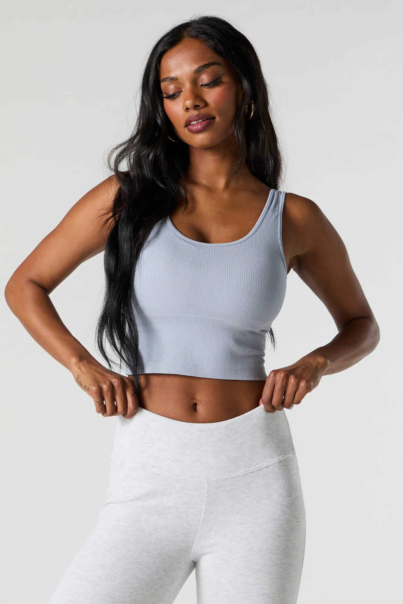 Seamless Ribbed Cropped Tank with Built-In Bra Cups sold by Charlotte Russe
