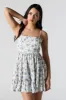 White Floral Tiered Mini Dress sold by Charlotte Russe