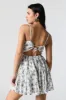White Floral Tiered Mini Dress sold by Charlotte Russe