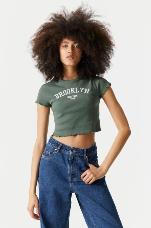 Embroidered Brooklyn Graphic Lettuce Hem Cropped T-Shirt sold by Charlotte Russe